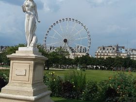 After leaving the Louvre Museum, walking a straight course toward Place de Concorde, we first passed the lovely Arch de Carrousel and then entered the Jardine Tuileries. Queen Catherine di Medici had the Palais Tuileries built here around 1564. Tuileries indicates that tile factories previously were located here. One hundred years later, around 1664, the gardner of King Louis XIV created a formal French style garden much like what we see today. Unfortunately,  the Palais Tuileries was destroyed by the fighters of the  Paris Commune who had taken over the palace during a revolution around 1870. The place where the palace stood is now just an extended part of the huge garden. .