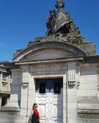 Farida posing. The structure used to be a gateway back in the years when there was a trench around Place Concorde. I think it was called Place Louis XVIII or something like that back then. There was a balustrade and the steps leading along the trench and through these gateways.