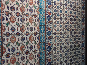 This is Islamic tile art which is part of the collection in the Islamic and pre-Islamic room in the Louvre museum.