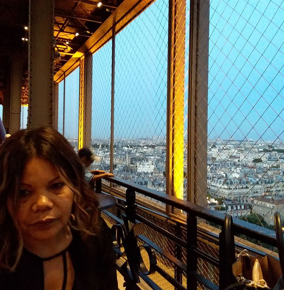 On the promenade of the Eiffel Tower second level. As dusk approached, the golden lights of the Eiffel Tower added an aura of gold all around us. The Michelin star Jules Verne restaurant is on this floor. No, we did not eat there 😄 We did eat at 58 Tour Eiffel restaurant though. It is on the first level of the Eiffel Tower. The towers' esplanade which surrounds both of the levels (between the ground and the summit) has several buffet restaurants. There is also a macaroon bar on the second level. Can't pass those up 😋. The meal at 58 Tour Eiffel was great. We had lots of fun choosing from 5 or 6 different entrés, mains, and desserts. The only one I did not like was the dessert with yogurt but that is probably my fault because I do not like yogurt. Every thing really was great though.