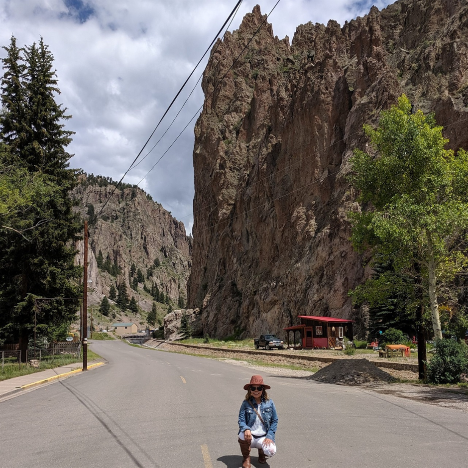 Farida posing in the middle of Main Street in Creede Colorado at the south end of Town just before one arrives at the Underground Mining Museum heading south through town. Creed is kinda small. It is only 4 or 5 long streets running through town with the businesses all on the Main Street and a few businesses on the cross streets. In fact, there are only about 300 permanent residents in Creede. But there is a lot of history here. Bob Ford, who shot and killed Jessie James settled down here for a short while until he himself was assassinated by somebody who had connections with the James Gang. The beauty of the place also is very abundant which is why I do not understand why there are not more people retiring here. If it was not for the cold, snowy winters, I would live MY last years here. Tom Boggs lived in the area around 1840. He was brother in law of Kit Carson. Approximately 10,000 people lived here during the silver and amethyst mining boom years. William Sidney 