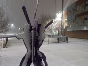 Photo taken during snow fall in front of the Isotopes Baseball Park in Albuquerque.