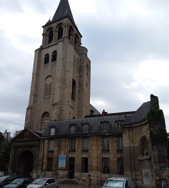 Saint Germain des Prés. This is one of the oldest churches built in what was a field out side the walls of Paris but eventually became center of one of the earliest suburbs of Paris. In this modern era with motor vehicles,  it is located within what is now considered central Paris.