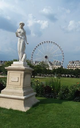 After leaving the Louvre Museum, walking a straight course toward Place de Concorde, we first passed the lovely Arch de Carrousel and then entered the Jardine Tuileries. Queen Catherine di Medici had the Palais Tuileries built here around 1564. Tuileries indicates that tile factories previously were located here. One hundred years later, around 1664, the gardner of King Louis XIV created a formal French style garden much like what we see today. Unfortunately,  the Palais Tuileries was destroyed by the fighters of the  Paris Commune who had taken over the palace during a revolution around 1870. The place where the palace stood is now just an extended part of the huge garden. .