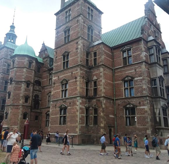 We are waiting for the group of people to be let into Rosenborg Castle so we can queue up at the entrance and wait for our turn. It is a self guided exploration inside the castle but only a certain amount of people are let in each time.