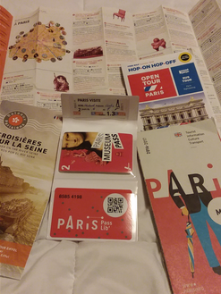 Things you will get with the Paris Pass Lib' package. Transportation pass,  Museum pass for about 60 museums, free ride on the Hop on Hop off bus, free ride on Paris Bateaux, Map of Paris, fold out list of the museums with descriptions of each one. The cost depends on how many days you want the passes for..