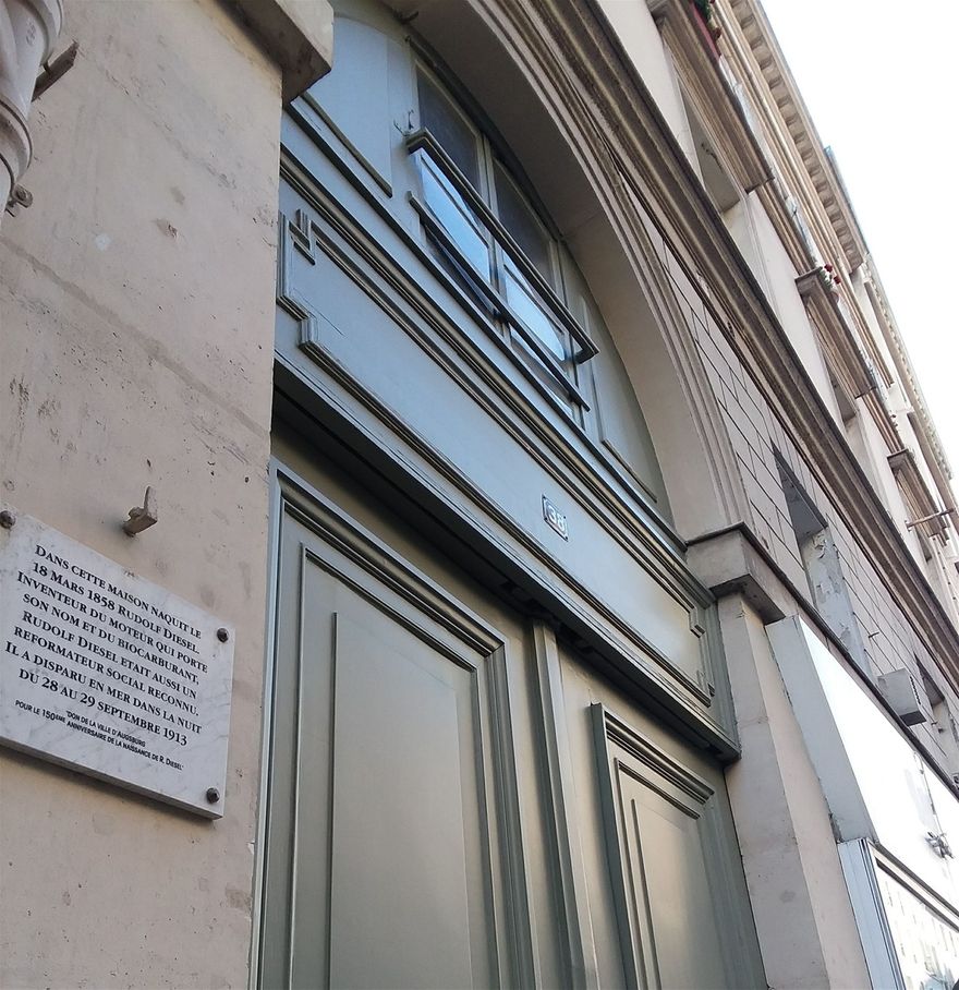 Rudolph Christian Karl Diesel invented the Diesel engine. Although he was a German inventor, he lived in this building in the Marais neighborhood of Paris. The plaque says that he was born here, he invented the engine that bears his name, that he was a recognized social reformer, and that he disappeared at sea. His disappearance was a mystery.