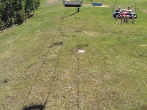 Continuing up the mountain on the redRed River Ski Lift.